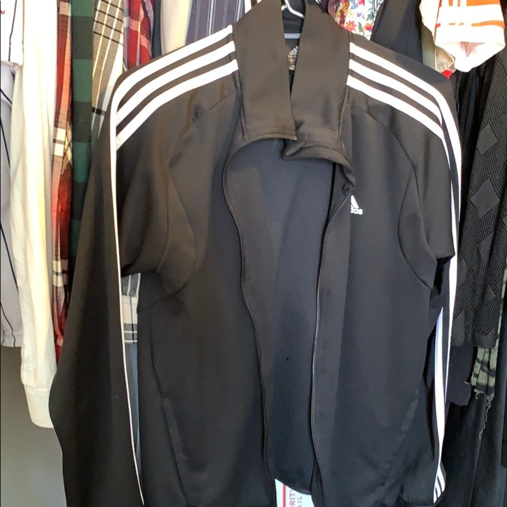 Black and white stripe Adidas jacket.